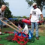 This is Frank Held's grandson Jerry Held and Great Grandson Duane Yarnell loading the GroMor on the parade float at the 2013 VGTCOA. 
Photos courtesy of Randy Wilcox. 