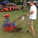 Frank Held's great grandson Dathan Held demonstrating the freshly restored GroMor cultivator at the 2013 VGTCOA show. 