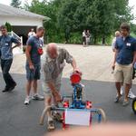 This is Frank Held's grandson Frank Held starting the GroMor cultivator. 
